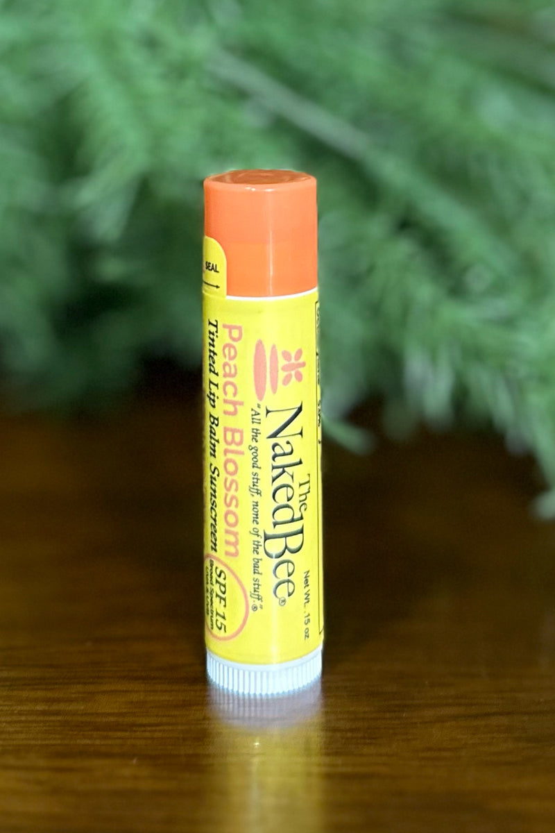 SPF 15 Orange Blossom Honey Tinted Lip Balm in Peach Blossom by Naked Bee-Gift-Naked Bee-Gallop 'n Glitz- Women's Western Wear Boutique, Located in Grants Pass, Oregon